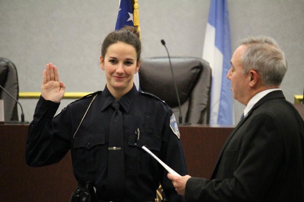 Officer Abby Ballman being sworn in by Mayor Marc Sirkin