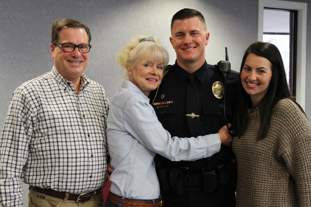 Sgt. Mike Jackson with his parents and wife, Casey